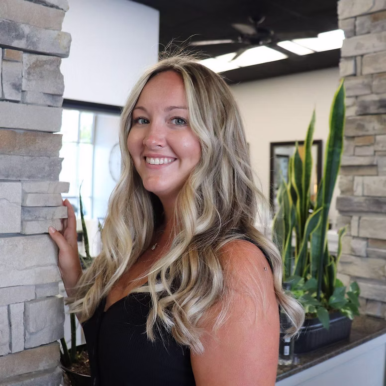 Smiling client with fresh curls at New York Hair Company Smiling client with fresh curls at New York Hair Company